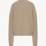 Back view of beige lethara sweater on white background, with no model shown.