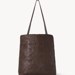 Front view of brown lilou woven tote on white background, with no model shown.