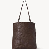 Front view of brown lilou woven tote on white background, with no model shown.