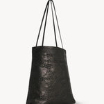 Back view of black lilou woven tote on white background, with no model shown.