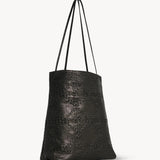 Back view of black lilou woven tote on white background, with no model shown.