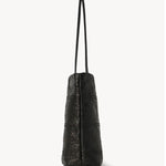 Side view of black lilou woven tote on white background, with no model shown.