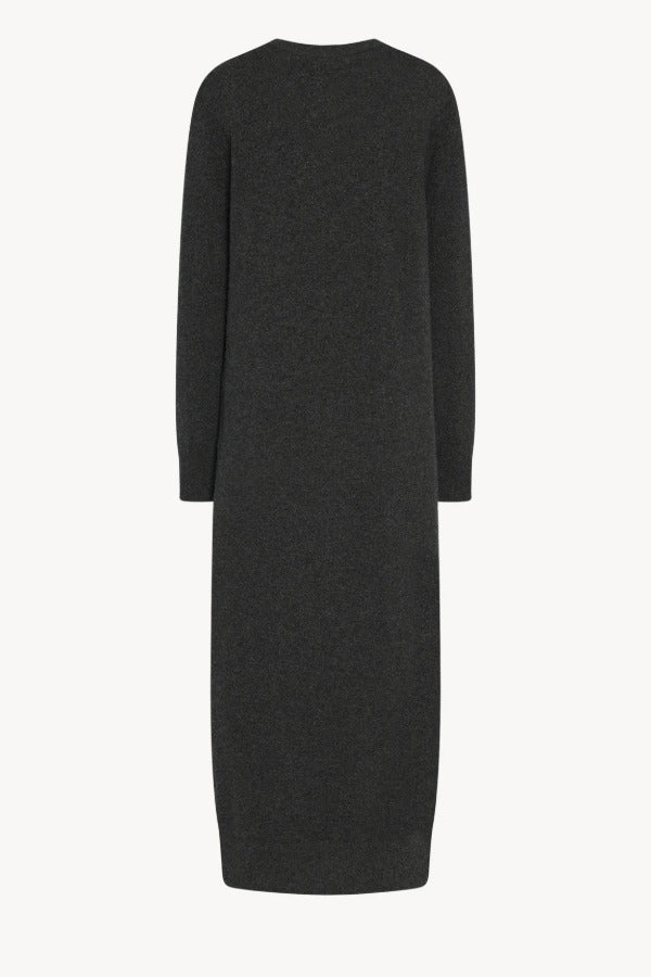 Back view of enzyme black loter dress on white background, with no model shown.