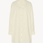 Front view of white luka shirt on white background, with no model shown.