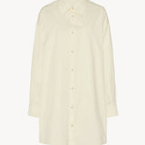 Front view of white luka shirt on white background, with no model shown.