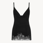 Back view of black makka top on white background, with no model shown.