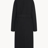 Back view of black malika coat on white background, with no model shown.