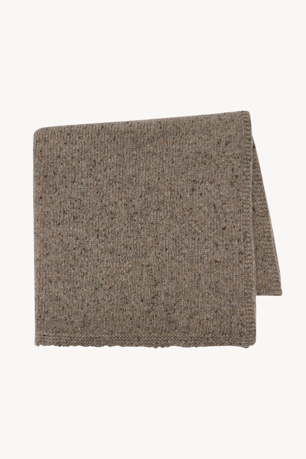 Folded view of sepia mantia scarf on white background, with no model shown.