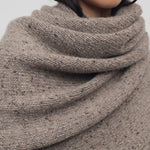 Front view of sepia mantia scarf on model, against a white background.