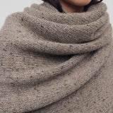 Front view of sepia mantia scarf on model, against a white background.