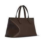 Front slanted view of deep brown marcel on white background, with no model shown.