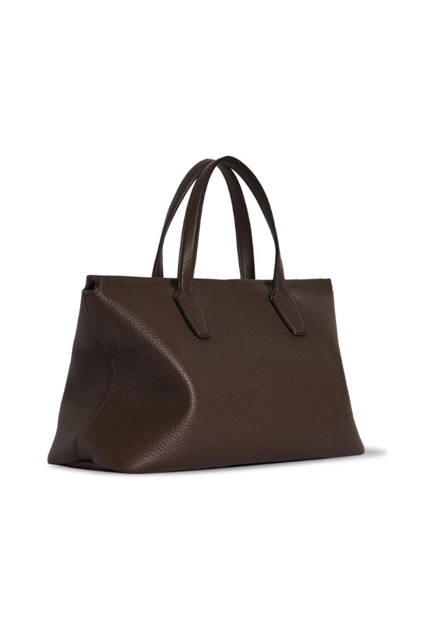 Front slanted view of deep brown marcel on white background, with no model shown.