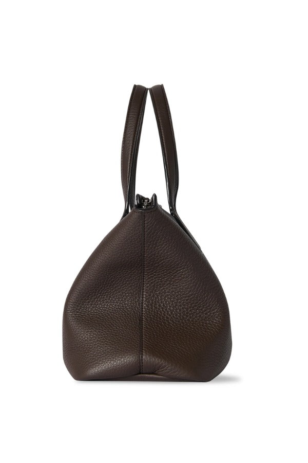 Side view of deep brown marcel bag on white background, with no model shown.