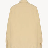 Back view of sand margan shirt on white background, with no model shown.