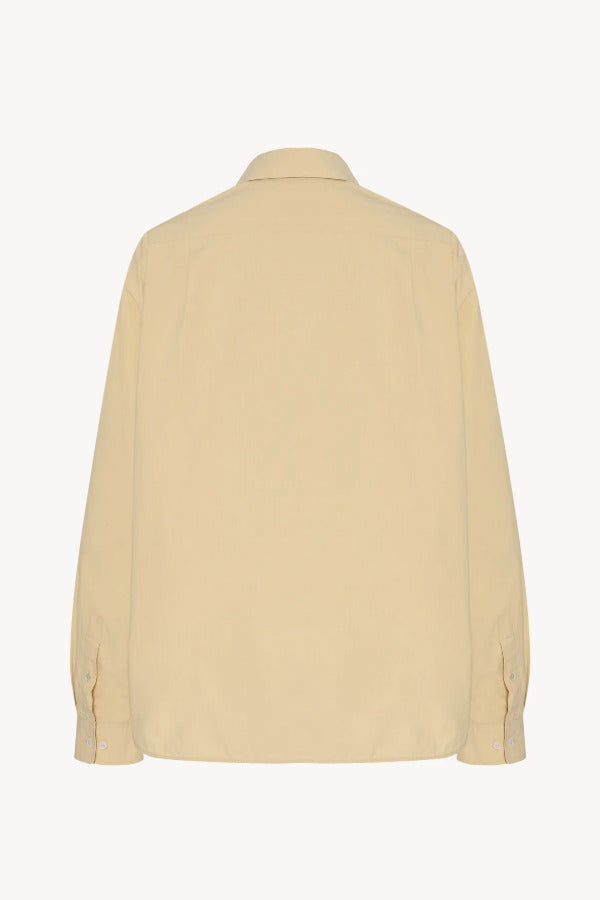Back view of sand margan shirt on white background, with no model shown.