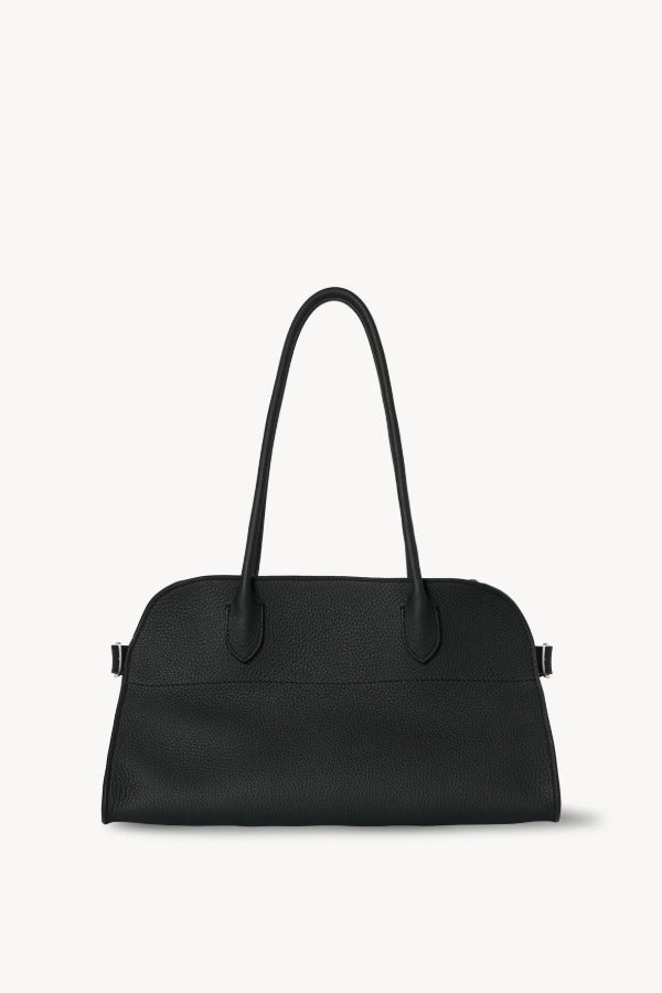 Front view of dark pine margaux shoulder 12 bag on white background, with no model shown.