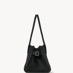 Side view of dark pine margaux shoulder 12 bag on white background, with no model shown.