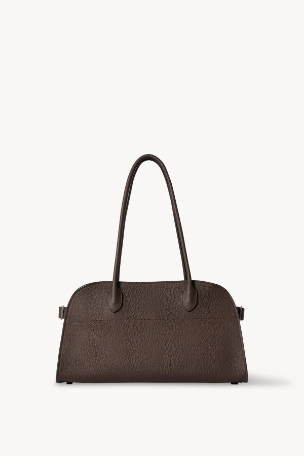 Front view of deep brown margaux shoulder 12 bag on white background, with. no model shown.