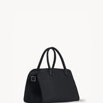 Side view of the Margaux 10 bag on white background, no model shown