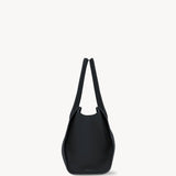 Side view of black marlo 12 bag on white background, with no model shown.