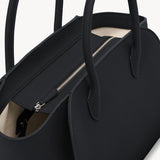 Zipper view of black marlo 12 bag on white background, with no model shown.