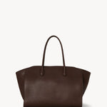 Front view of deep brown marlo 14 bag on white background, with no model shown. 