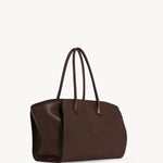 Front slanted view of deep brown marlo 14 bag on white background, with no model shown.