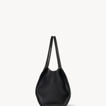 Side view of black marlo 14 bag on white background, with no model shown.