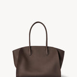 Front view of deep brown marlo 14 bag on white background, with no model shown.
