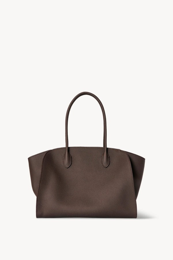 Front view of deep brown marlo 14 bag on white background, with no model shown.