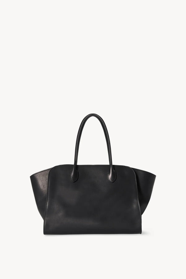Front view of black marlo 14 bag on white background, with no model showm.
