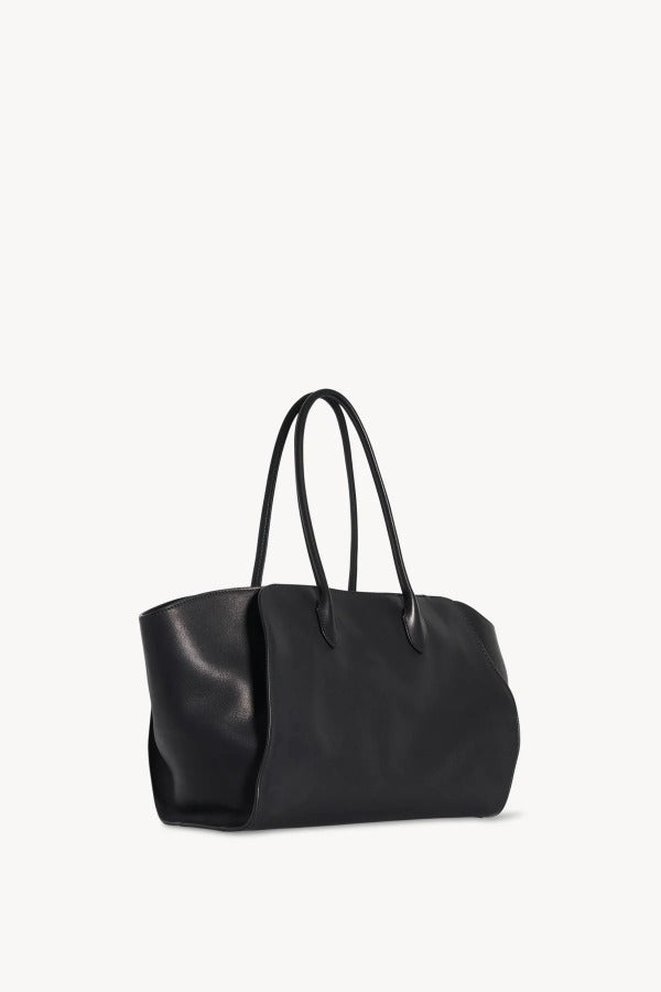 Front slanted view of black marlo 14 bag on white background, with no model shown.