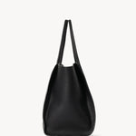 Side view of black marlo 17 bag on white background, with no model shown.