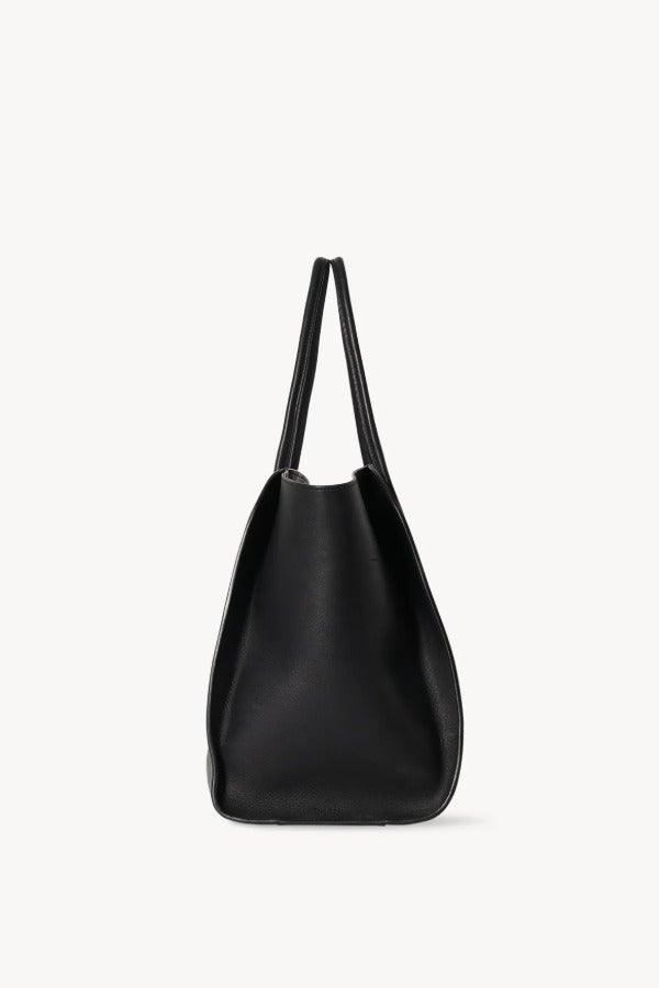 Side view of black marlo 17 bag on white background, with no model shown.