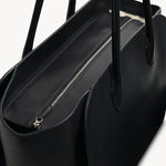 Zipper view of black marlo 17 bag on white background, with no model shown.