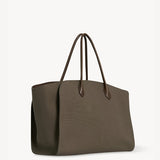 Front slanted view of taupe marlo 17 bag on white background, with no model shown.