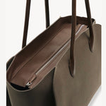 Zipper view of taupe marlo 17 bag on white background, with no model shown.