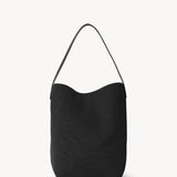 Back view of black medium n/s park tote on white background, with no model shown.