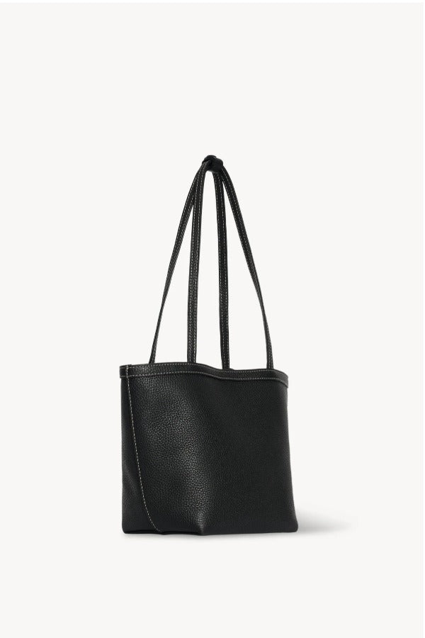 Front slanted view of black medium park tote on white background, with no model shown.