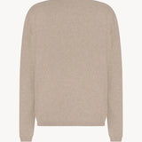 Back view of beige melange almot sweater on white background, with no model shown.