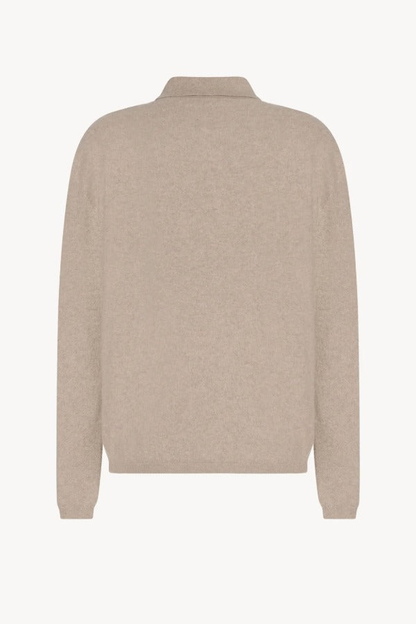 Back view of beige melange almot sweater on white background, with no model shown.