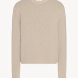 Front view of ecru nikola sweater on white background, with no model shown.