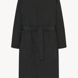 Front view of black tarian coat on white background, with no model shown.