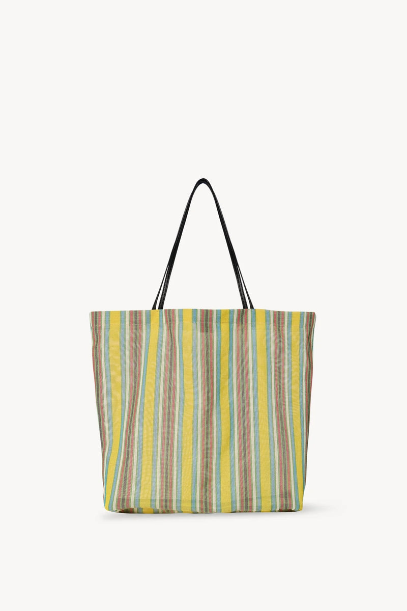 Front view of mesh and leather bag on white background, with no model shown.