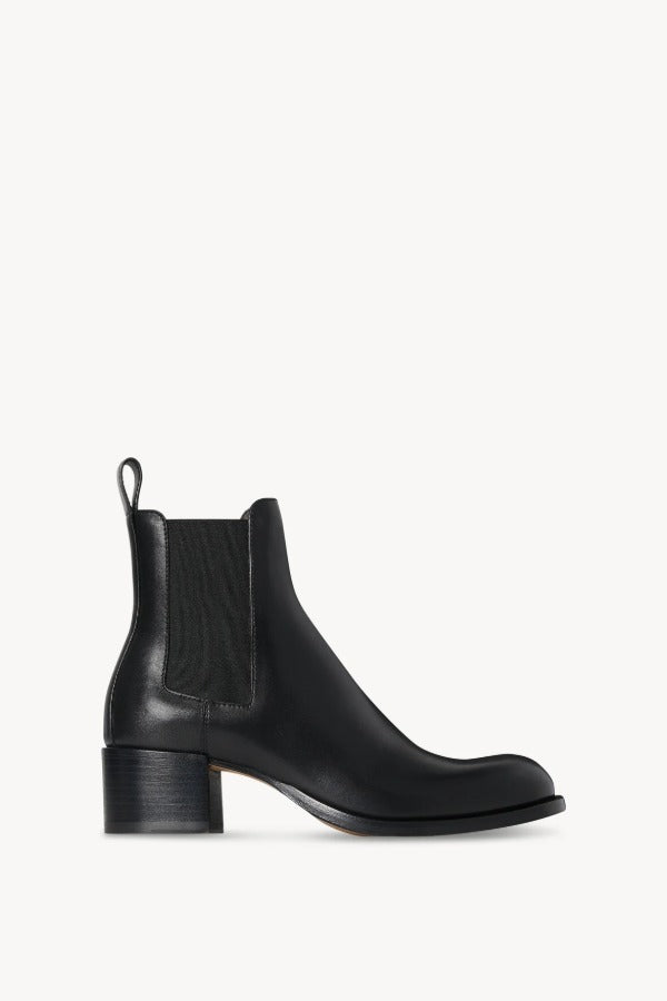 Right side view of black nobilis boot on white background, with no model shown.