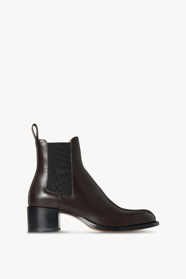 Right side view of brown nobilis boot on white background, with no model shown.