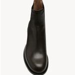 Overhead view of brown nobilis boot on white background, with no model shown.