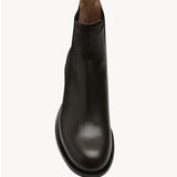 Overhead view of brown nobilis boot on white background, with no model shown.