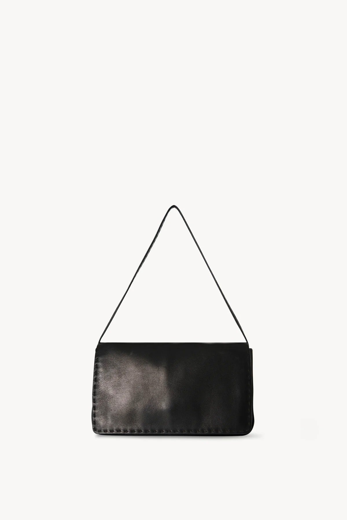 Front view of black nuance bag on white background, with no model shown. 