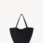 Front view of black park tote three canvas on white background, with no model shown.